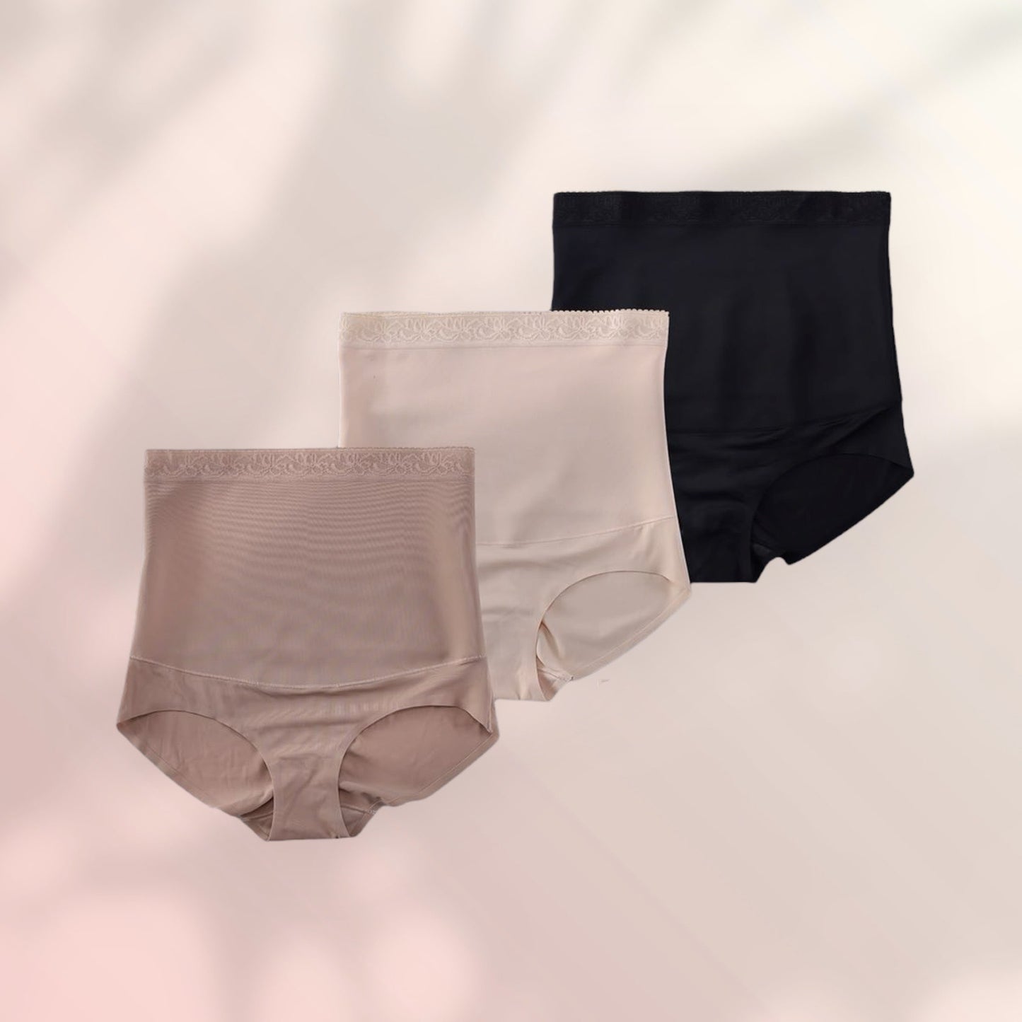 Culottes gainantes grande taille en noir, beige et chair, suspendues.