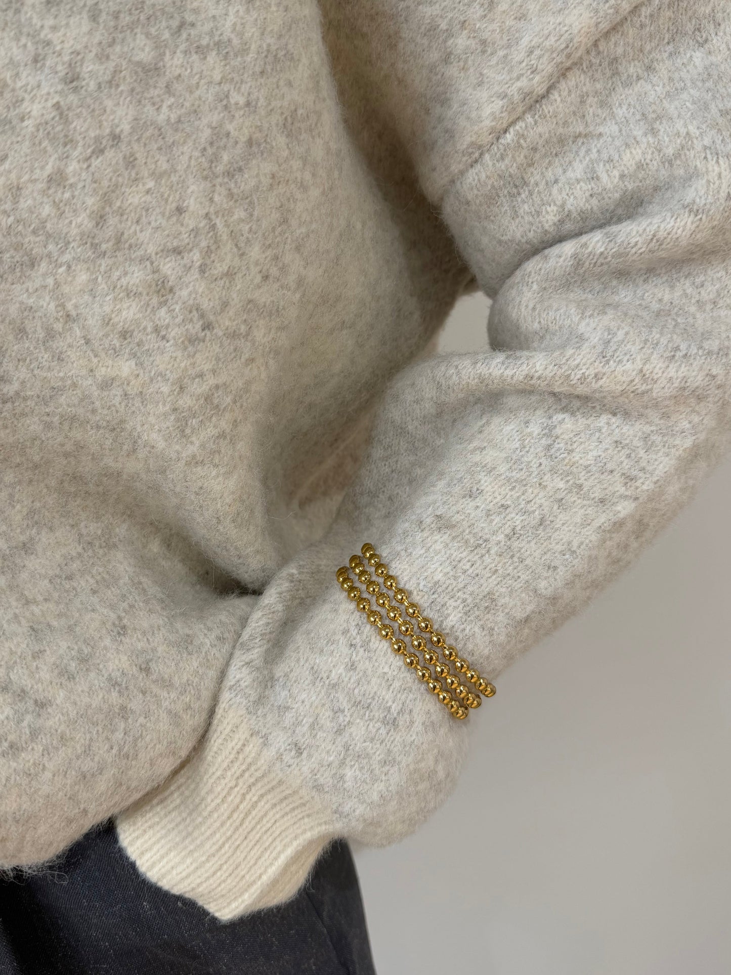 Bracelet manchette doré à perles