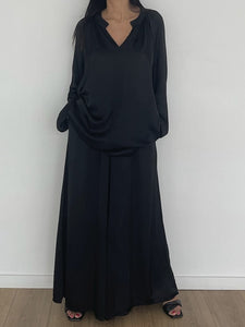 Ensemble tunique noire en soie avec pantalon effet jupe pour un style raffiné