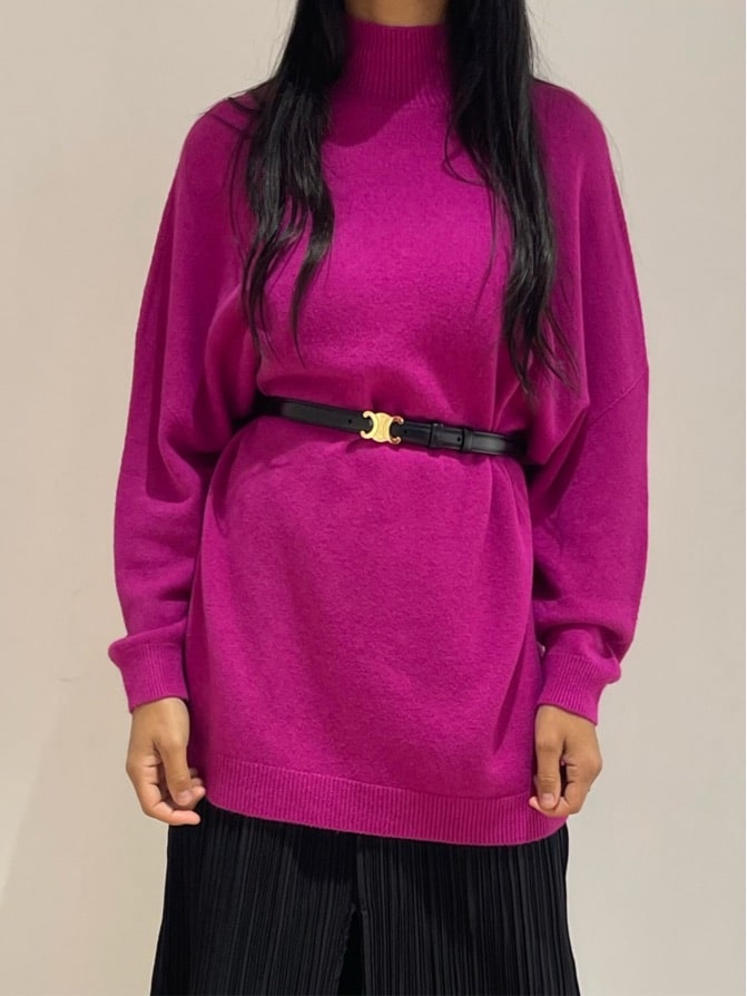 Une touche colorée avec cette robe-pull fuchsia pour illuminer le quotidien.